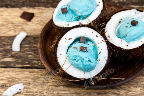 Preview: Blue ice cream in coconut bowl.