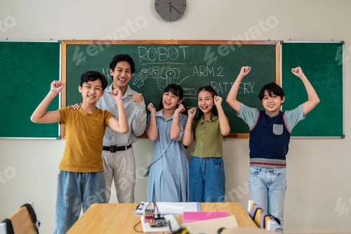 Preview: Portrait of Asian adorable student standing with teachers at school.