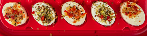 Preview: cheese appetizer soft cheese with herbs and tomatoes pieces fresh tasty food dish delicious gourmet