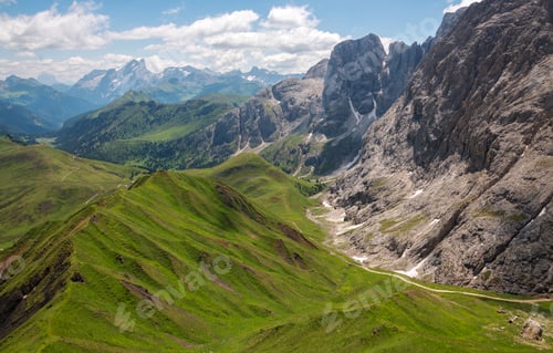 Preview: Hiking in the meadows of the Dolomites mountains in Italy