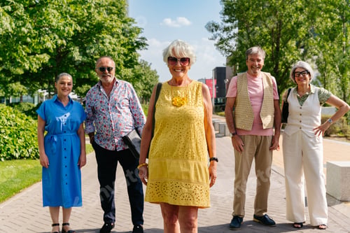 Preview: Group of senior friends meeting outddors in the city and having fun