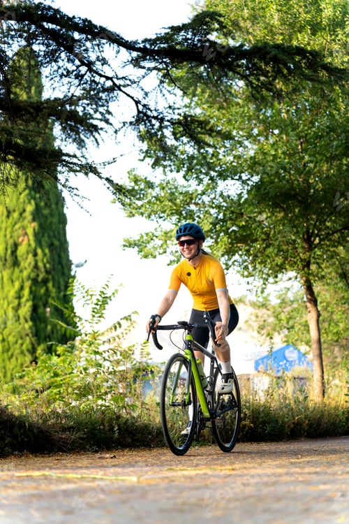 Preview: Professional cyclist riding a road bike in a park
