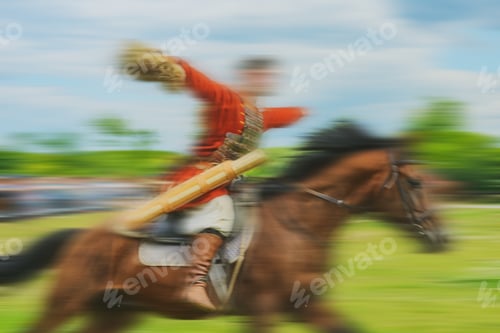 Preview: Blurred Background- Riding A Horse. Demonstration Performance Sports Show