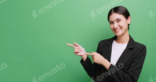 Preview: Happy young business woman showing something or copy space for product or sign text.