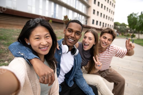 Preview: Happy joyful group of friends taking a selfie smiling. Multicultural young carefree people having