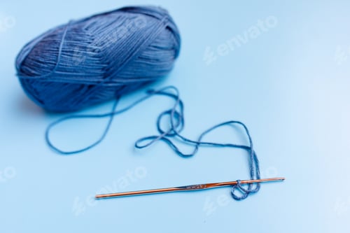 Preview: Skeins of wool yarn and knitting needles