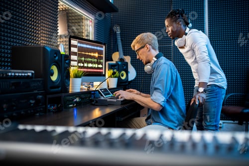 Preview: Two Men Working in a Professional Sound Studio