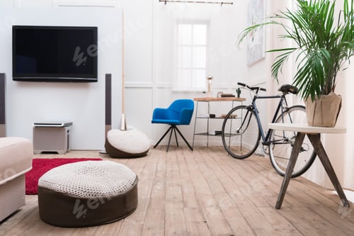 Preview: Interior of living room with TV and bicycle