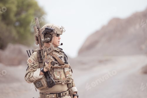 Preview: Soldiers in camouflage military uniforms carrying weapons Reconnaissance missions in rugged mountain