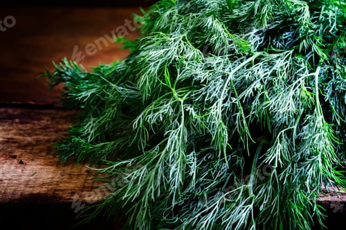 Preview: Fresh dill on an old birch board