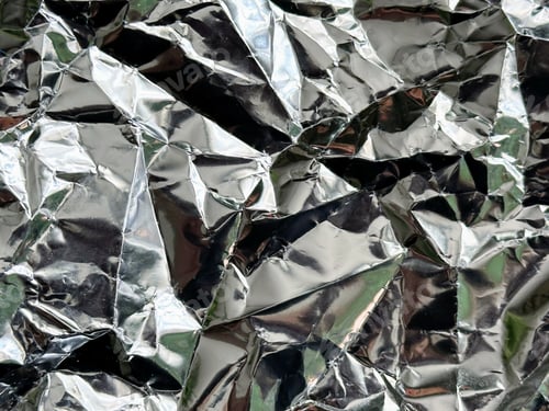 Preview: Crumpled silver aluminium foil texture background, close up