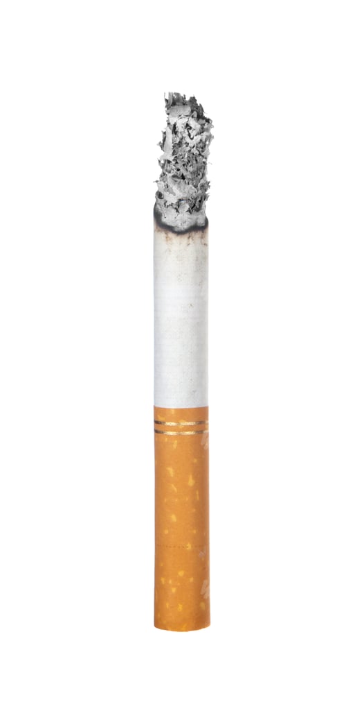 Preview: Burning cigarette isolated on white