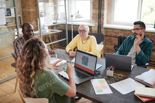 Preview: Business people discussing new strategy