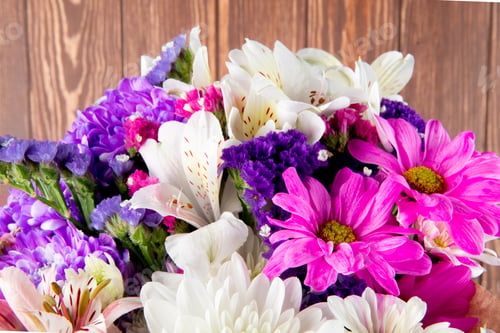 Preview: side view of a bouquet of pink white and purple color statice alstroemeria