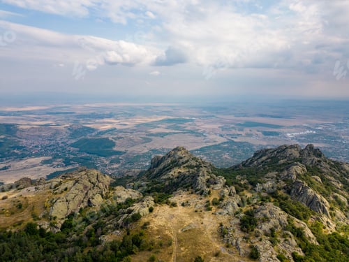 Preview: Aerial view unfolds of the rugged peaks of Bulgaria's Stara Planina mountains, towering majestically