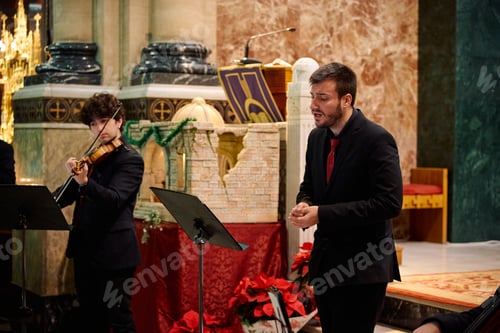 Preview: Musicians perform classical concert in historic church during holiday season