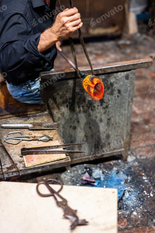 Preview: Glass blower at work in workshop in Murano, Italy