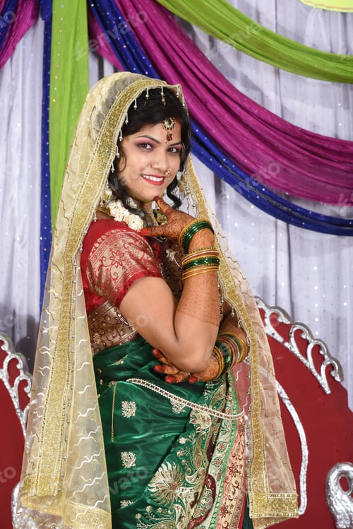 Preview: Indian bride wearing traditional wedding cloths in marriage ceremony.