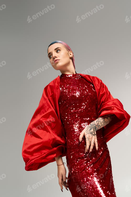 Preview: Festive winter celebration with a beautiful young woman in a striking red outfit