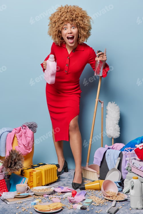 Preview: House keeping and home cleaning. Young european delighted smiling woman on blue background and