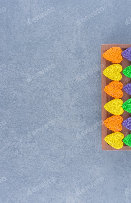 Preview: Colorful cookies on the board , on the marble background
