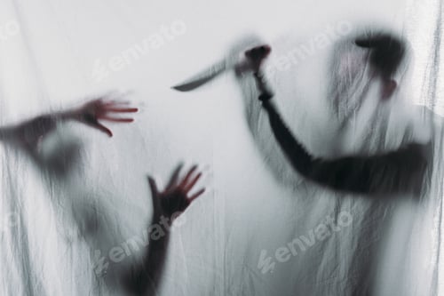 Preview: silhouette of someone holding knife and murdering victim, crime concept