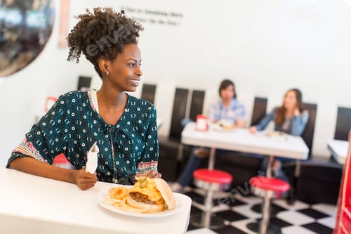 Preview: Young woman in the diner