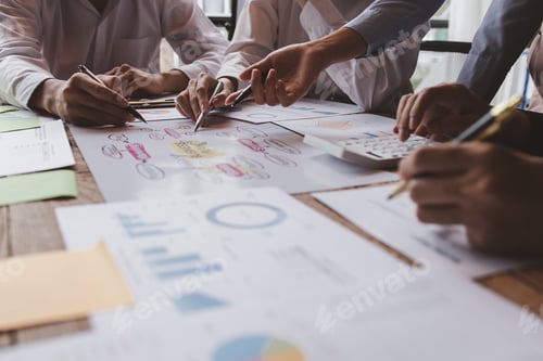 Preview: Business People Meeting using chart graph calculator, laptop computer,stock market chart paper for a