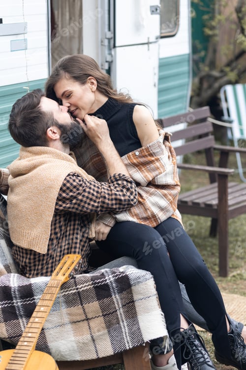Preview: Young beautiful loving coupe, newlyweds, travelling in the camper van across country on honeymoon