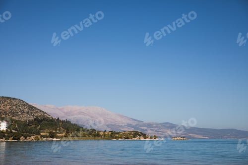 Preview: beautiful landscape with tranquil water and hills on coast, egirdir, turkey
