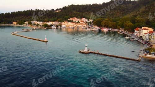 Preview: Charming marina featuring picturesque watercraft and lively activity