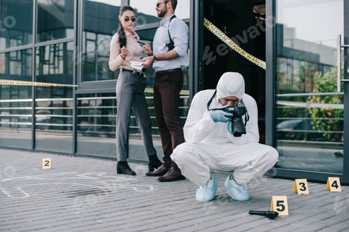 Preview: criminologist making photo at crime scene