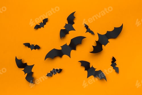 Preview: halloween and decoration concept - paper bats flying