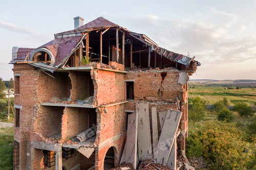 Preview: Old ruined building after earthquake. A collapsed brick house .