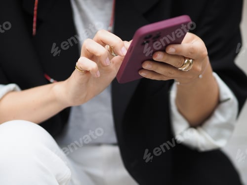 Preview: Closeup of the hand of a young girl working in the phone, using technology, texting, chatting.