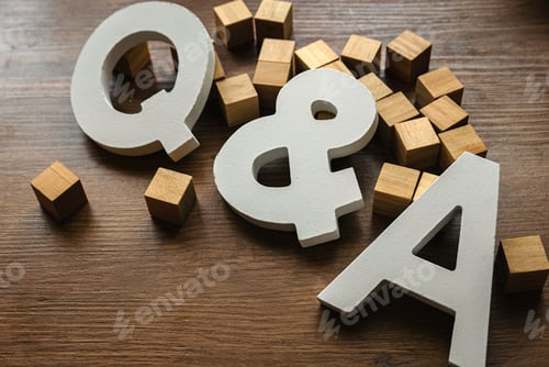 Preview: Question and answers concept. Wooden alphabet of letter q and a.