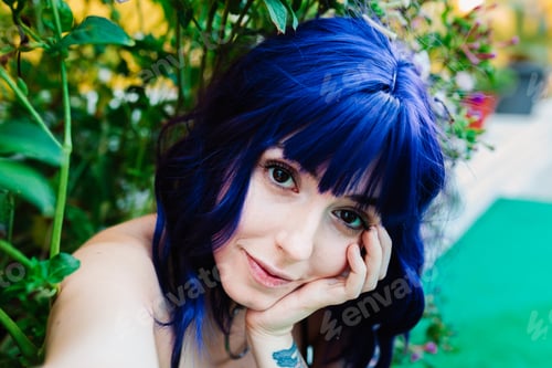 Preview: Photo of adorable young woman making selfie outdoors backyard