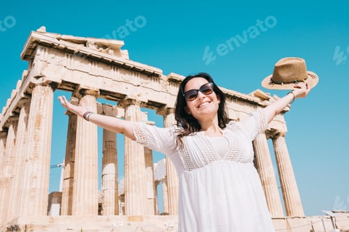 Preview: Greece, Athens, happy woman visiting the Parthenon temple on the Acropolis