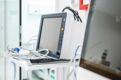 Preview: Medical Monitoring Equipment in a Hospital Room During Daytime