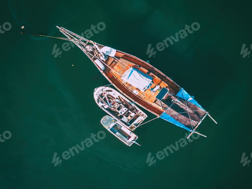 Preview: Overhead aerial shot of a boat at the beach