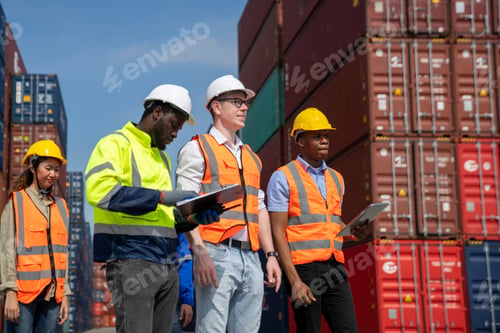 Preview: Group of engineer worker and manager standing in the shipping yard container.