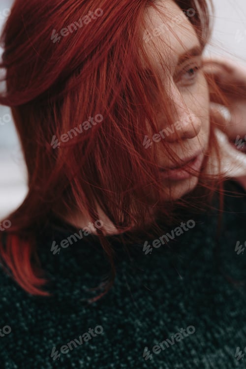 Preview: Beautiful And Stylish Girl With Red Hair Walks In The City And Her Hair Is In The Wind