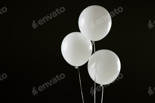 Preview: Composition of close up of new years balloons on black background