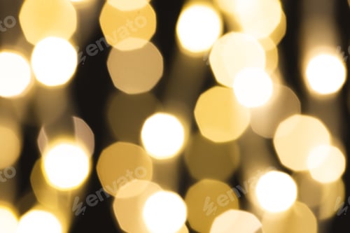 Preview: Multiple yellow bokeh lights with copy space on dark background