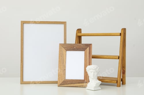 Preview: Photo frames with blanks on the table on a white background
