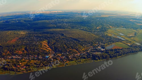 Preview: Photo from a drone of a beautiful summer landscape over the river.