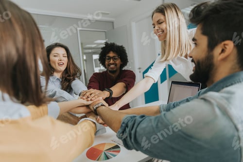 Preview: Successful young businesspeople having meeting in modern office