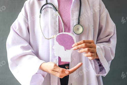 Preview: Doctor holding human brain shape closeup