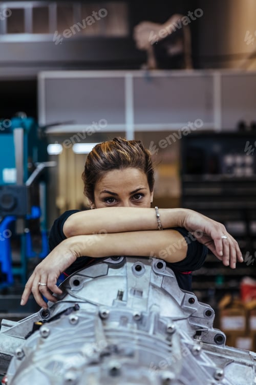 Preview: Woman working in a mechanical workshop