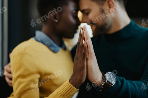 Preview: Close-up of couple in love holding hands.
